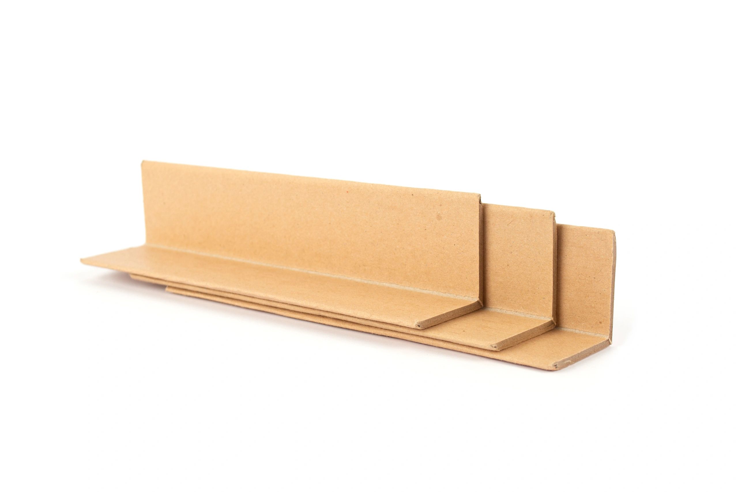 Kraft paper edge protectors (corner board) stacked