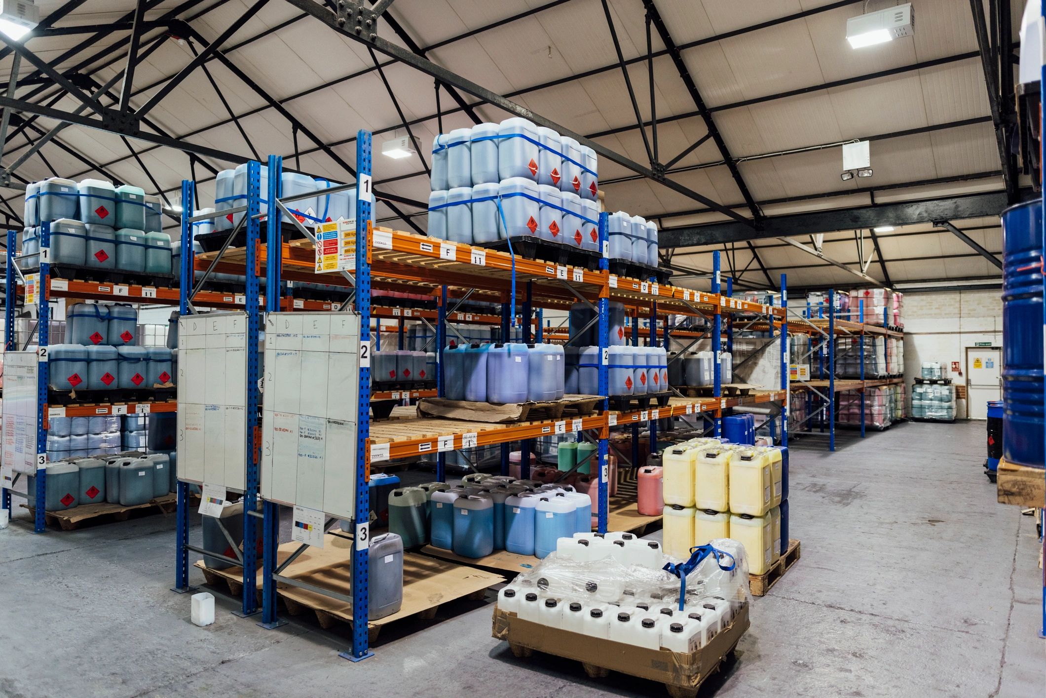 Industrial warehouse storage with pallets and wrapped goods