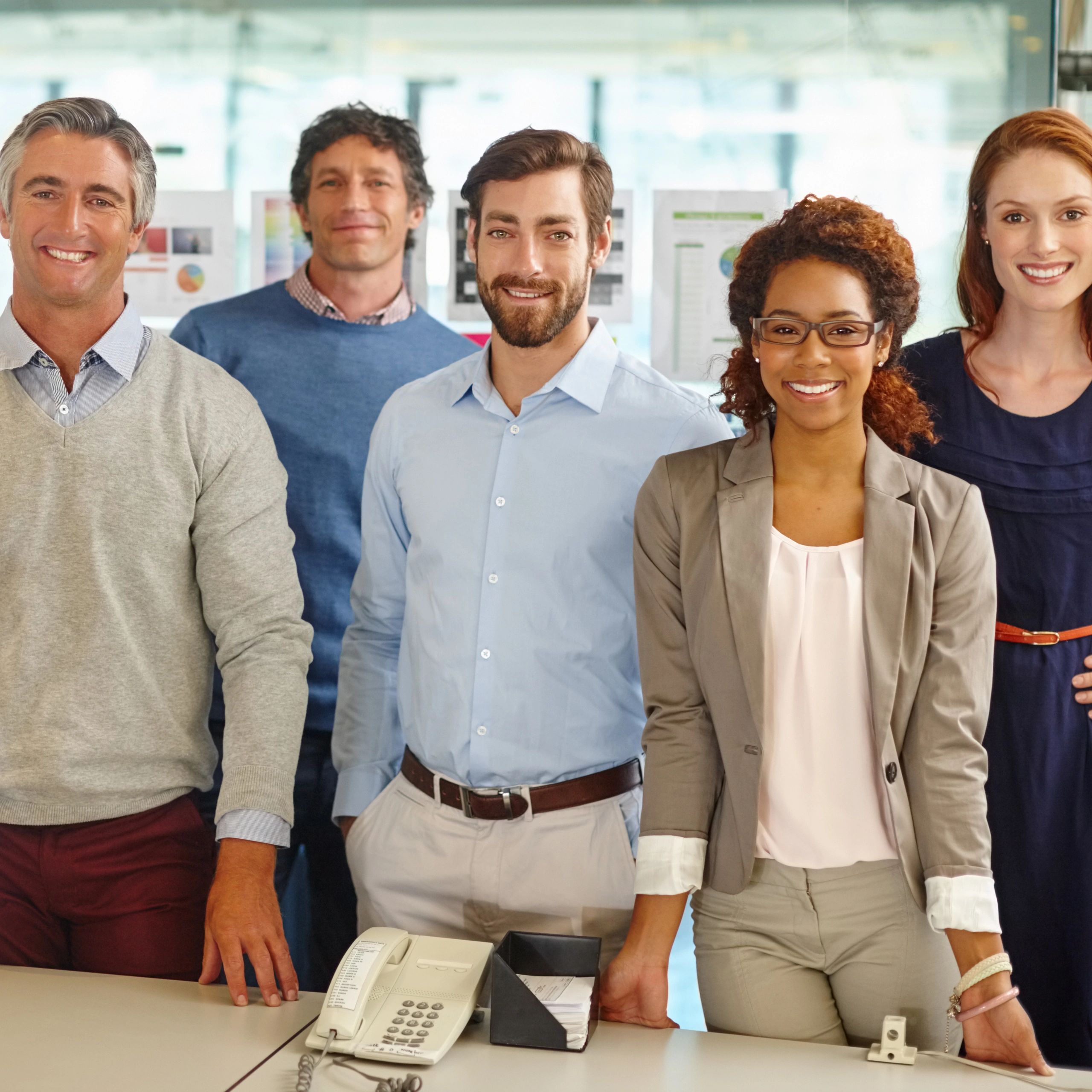 Team members collaborating in an office setting